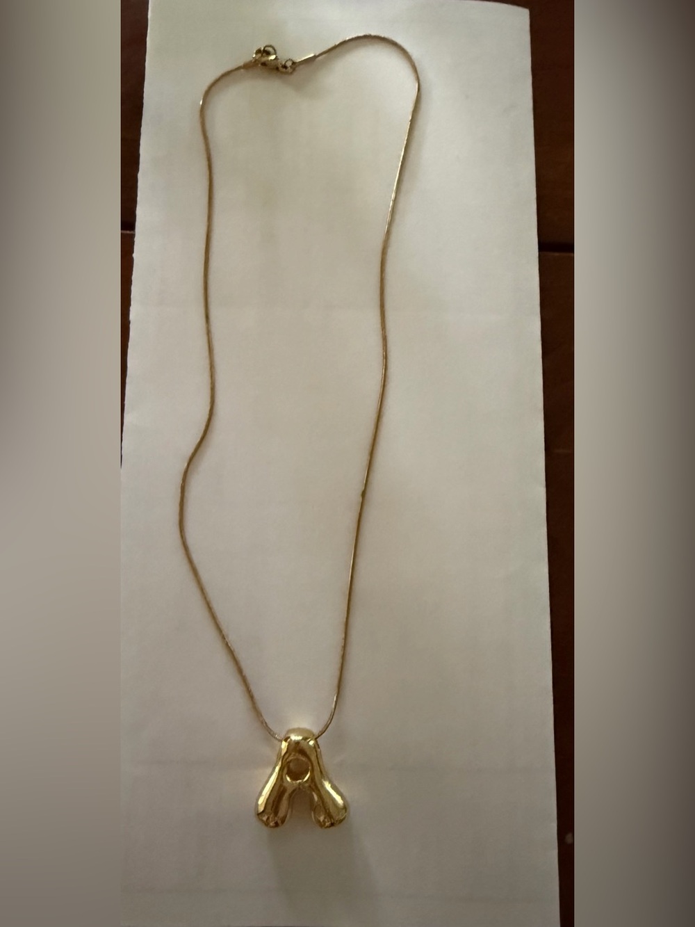 Gold necklace “A”